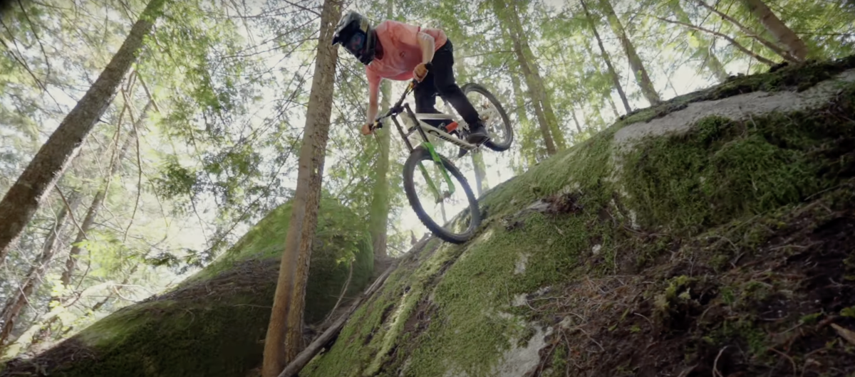 This mountain biker is basically falling Down a Mountain in Style