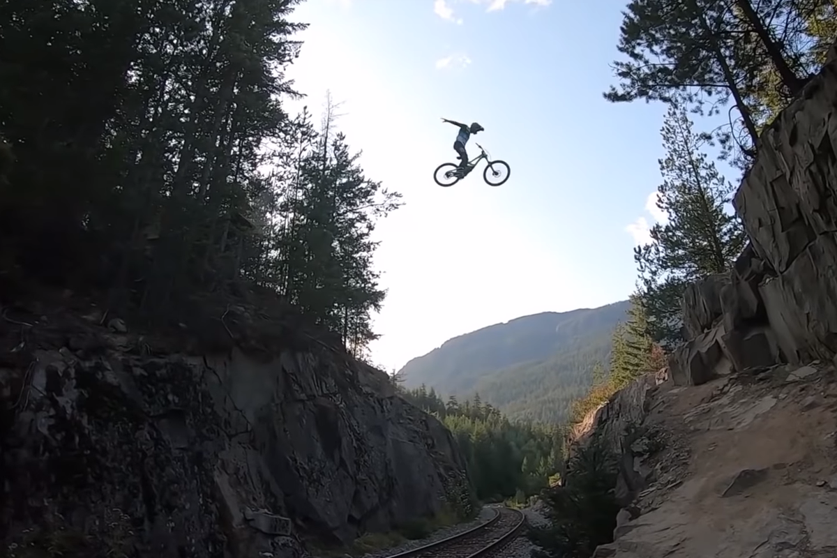 Mountain Biker Leaps Over Moving Freight Train - BikeMag